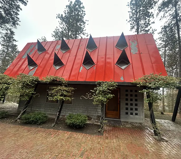Exterior house painting service featuring a freshly painted home with vibrant colors and clean lines.