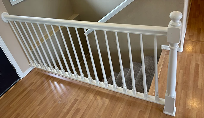 painted railings and new laminate flooring