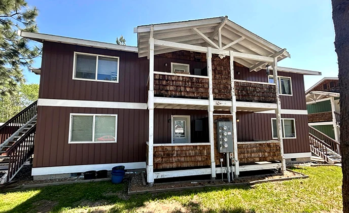 brown house after exterior painting and exterior cleaning