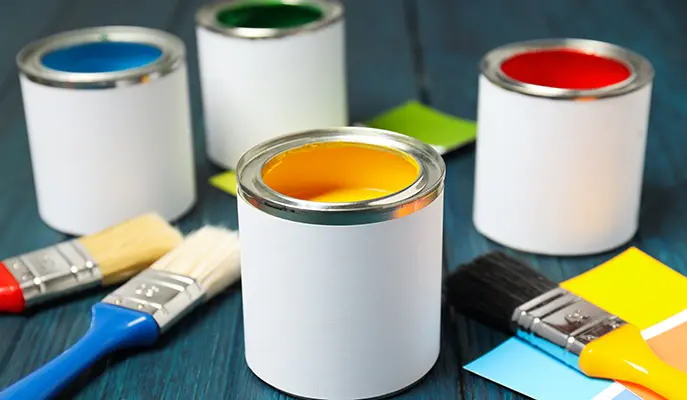 paints of different colors and paint brushes