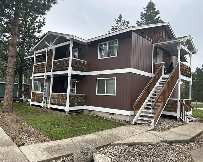 final brown house after exterior painting