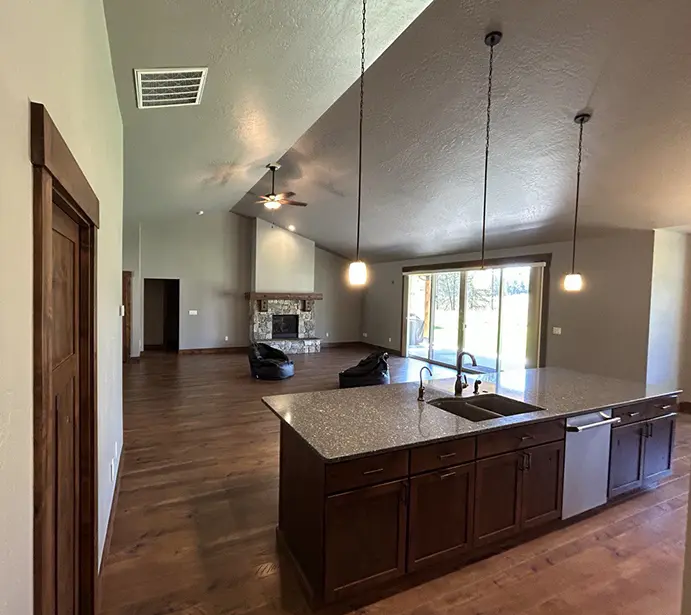 kitchen and hall after installing new floors and new interior paint