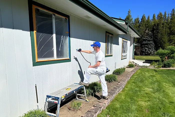 the painter repaints the house white