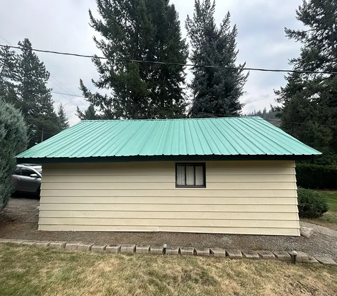 house after cleaning and painting roof and exterior painting