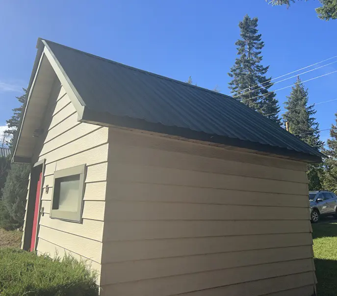 house after cleaning and painting roof and exterior painting