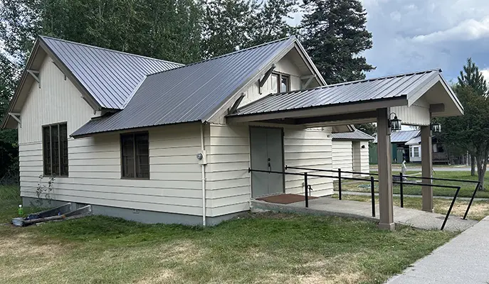 Roof painting service showcasing vibrant color application on a home's roof.